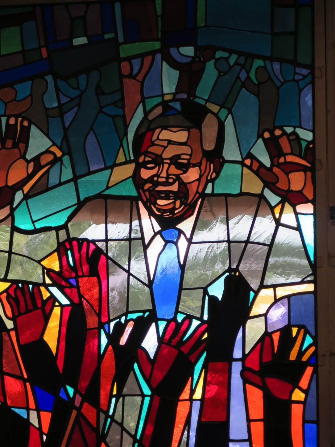 Stained Glass window in Soweto church depicting Nelson Mandela.