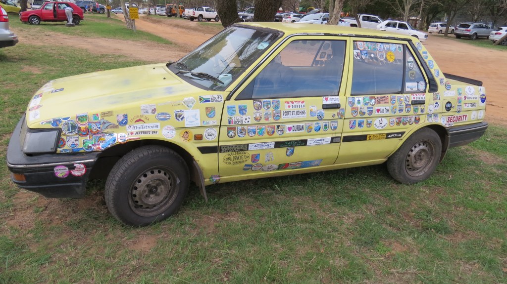 This car thinks it's a suitcase with all those travel stickers.