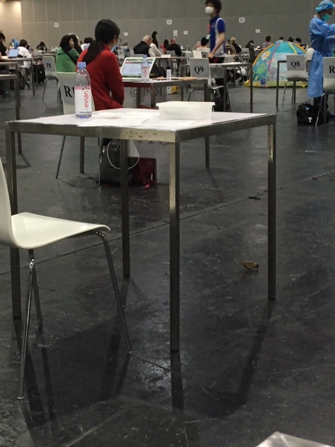 expo centre hall people waiting for covid-19 test results Hong Kong